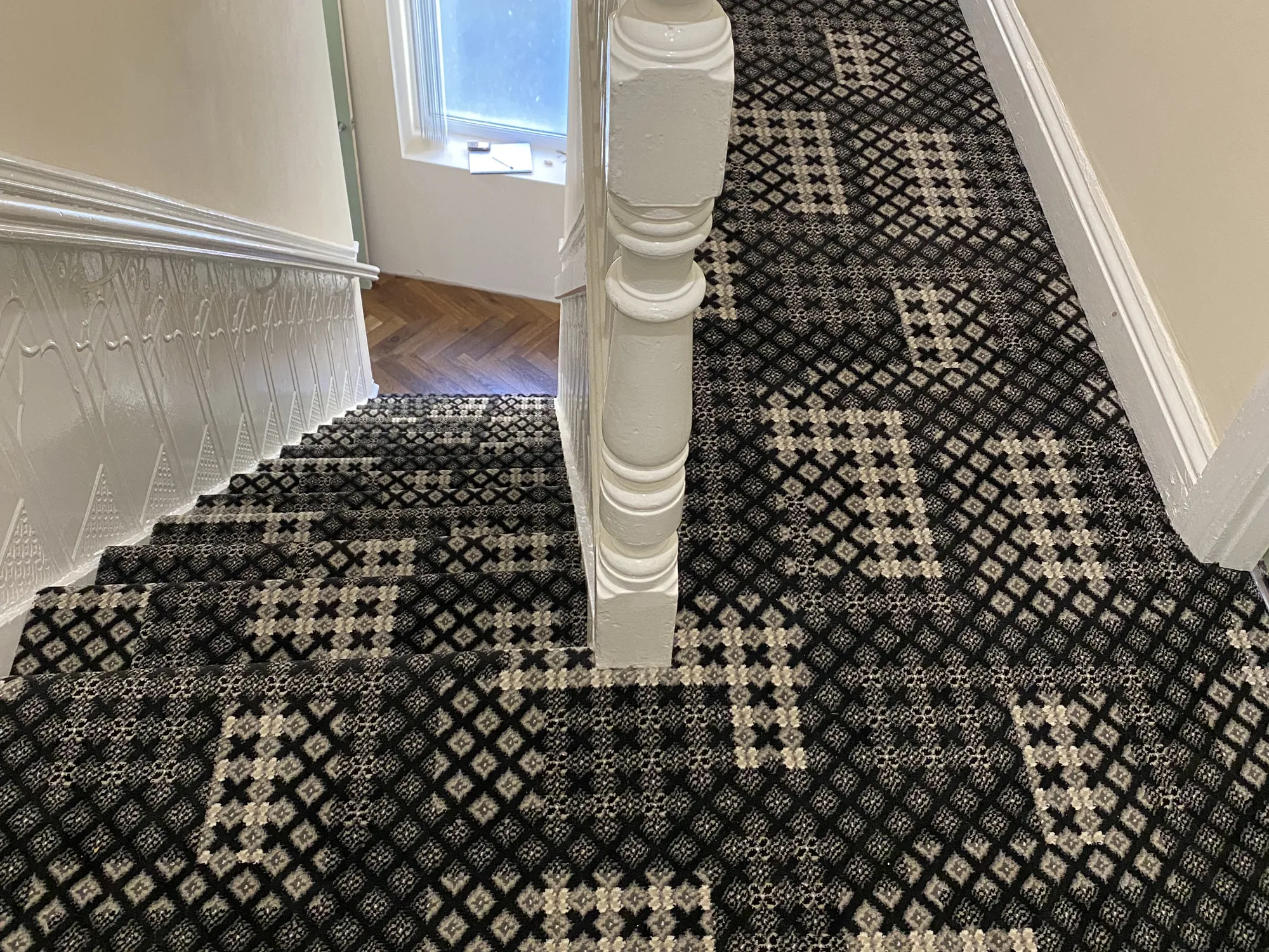 Patchwork-pattern Wilton carpet fitted by SR Carpets & Floors