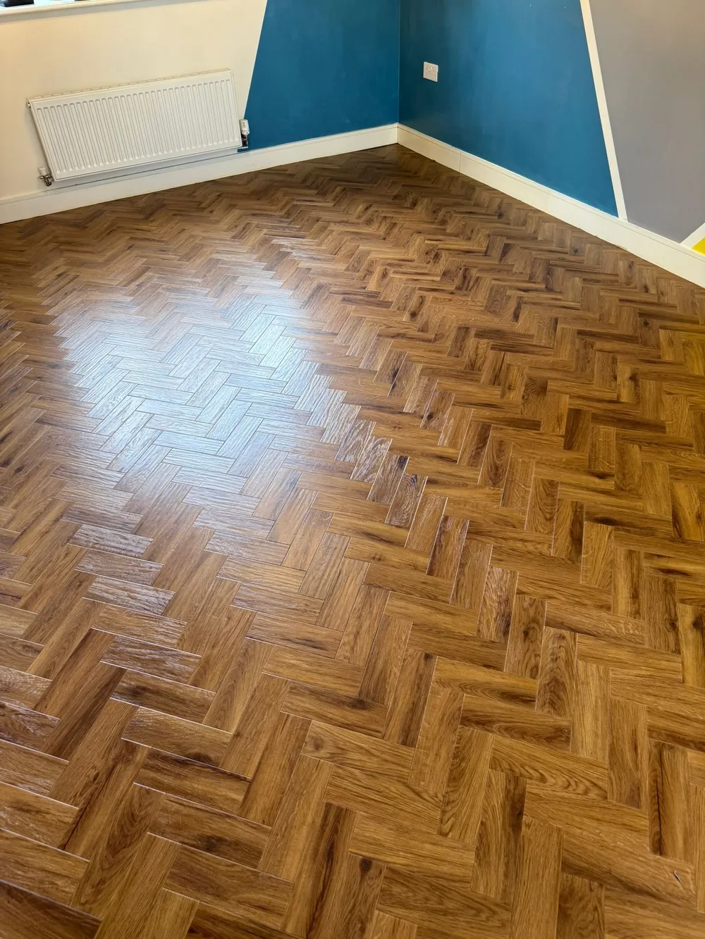 Herringbone LVT in a bedroom