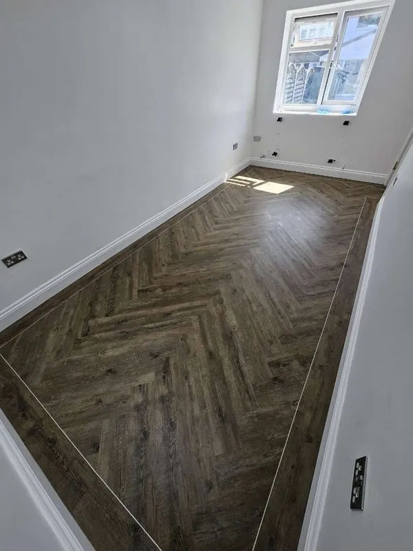 Herringbone LVT with a border strip