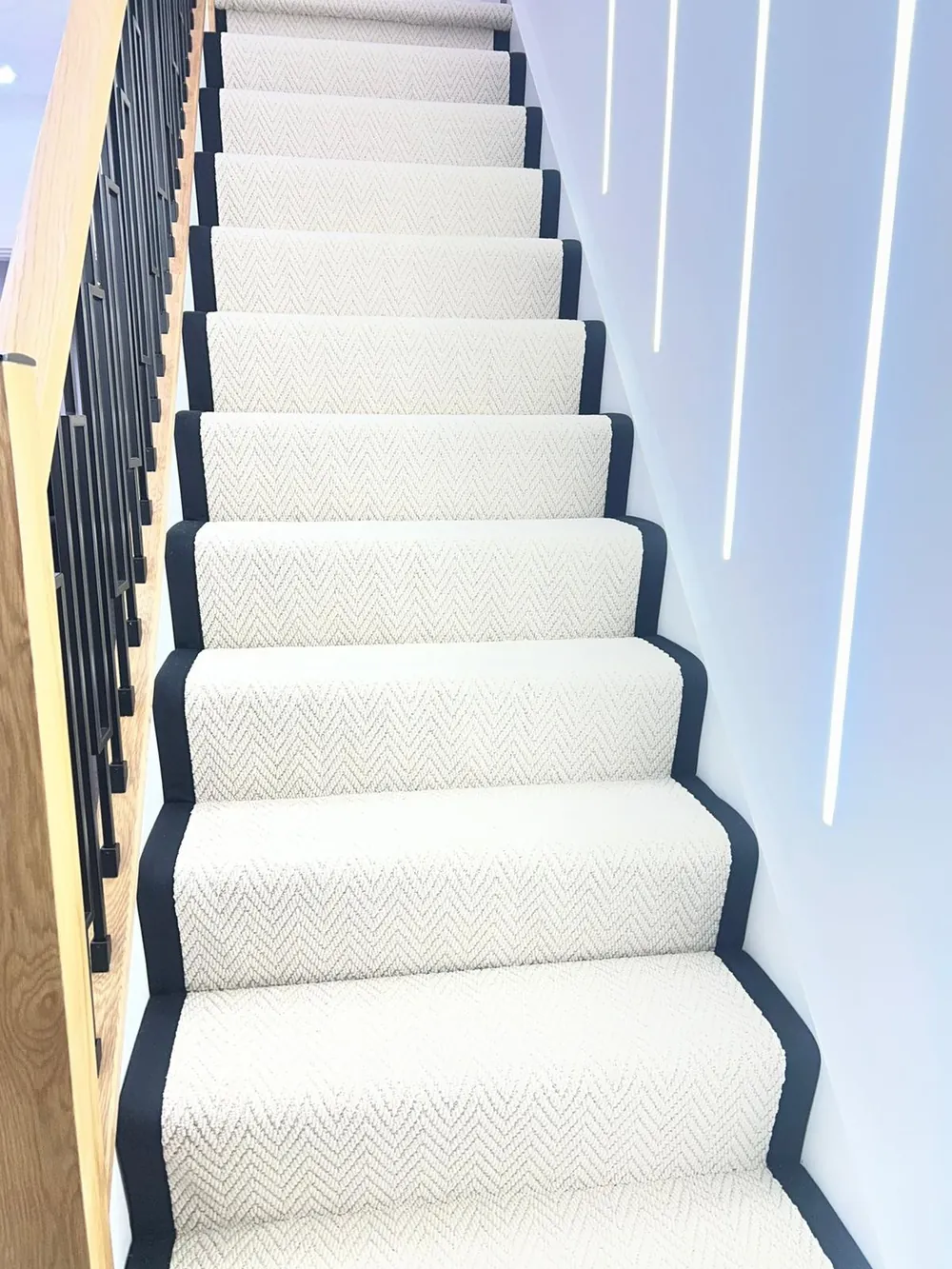Herringbone stair runner with black taping