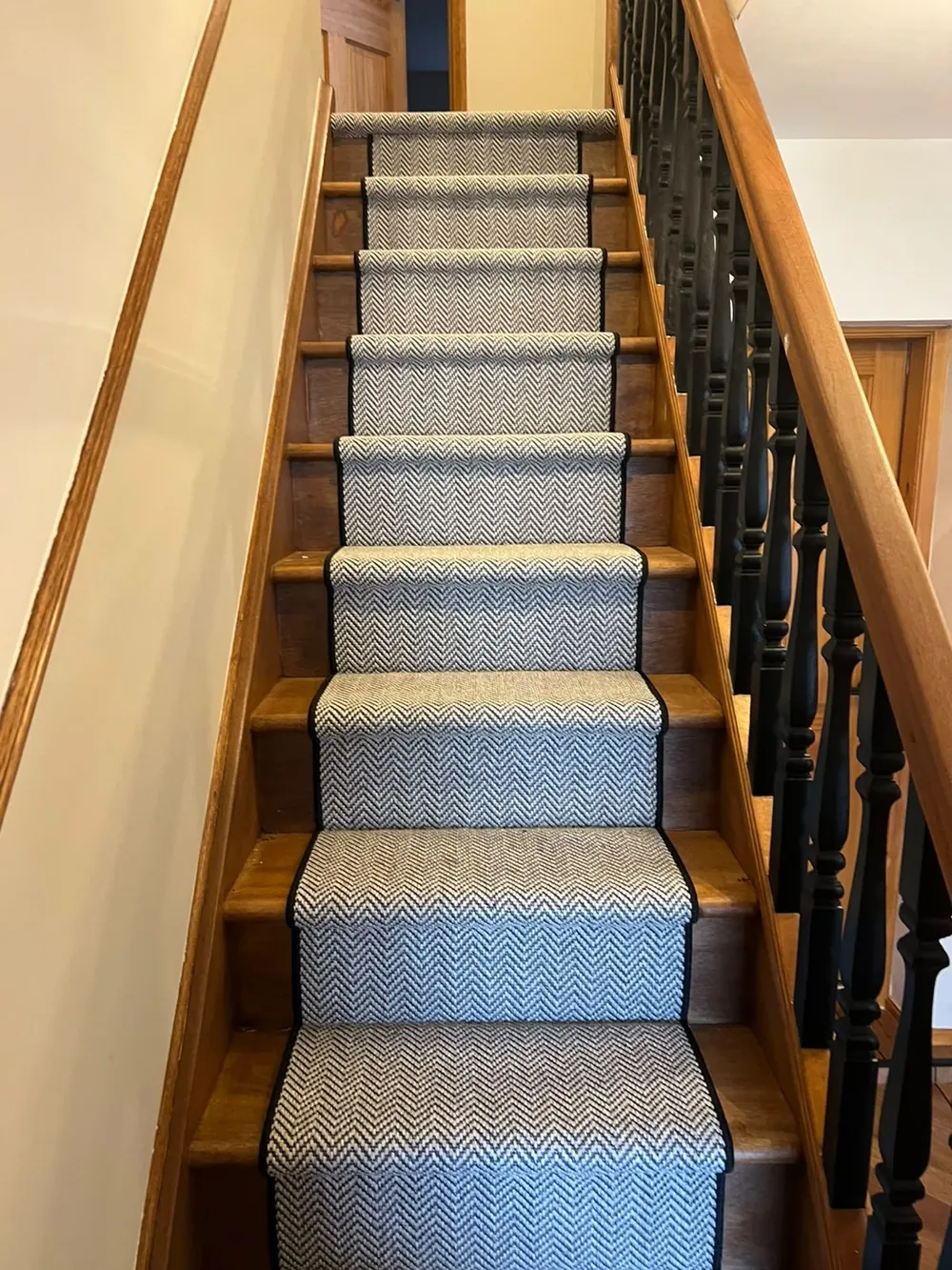 Herringbone stair runner with dark taping