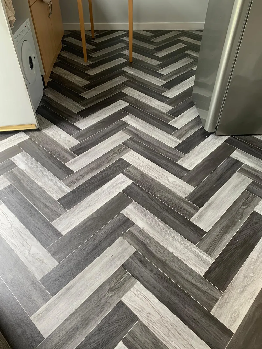 Black and white herringbone vinyl in a kitchen