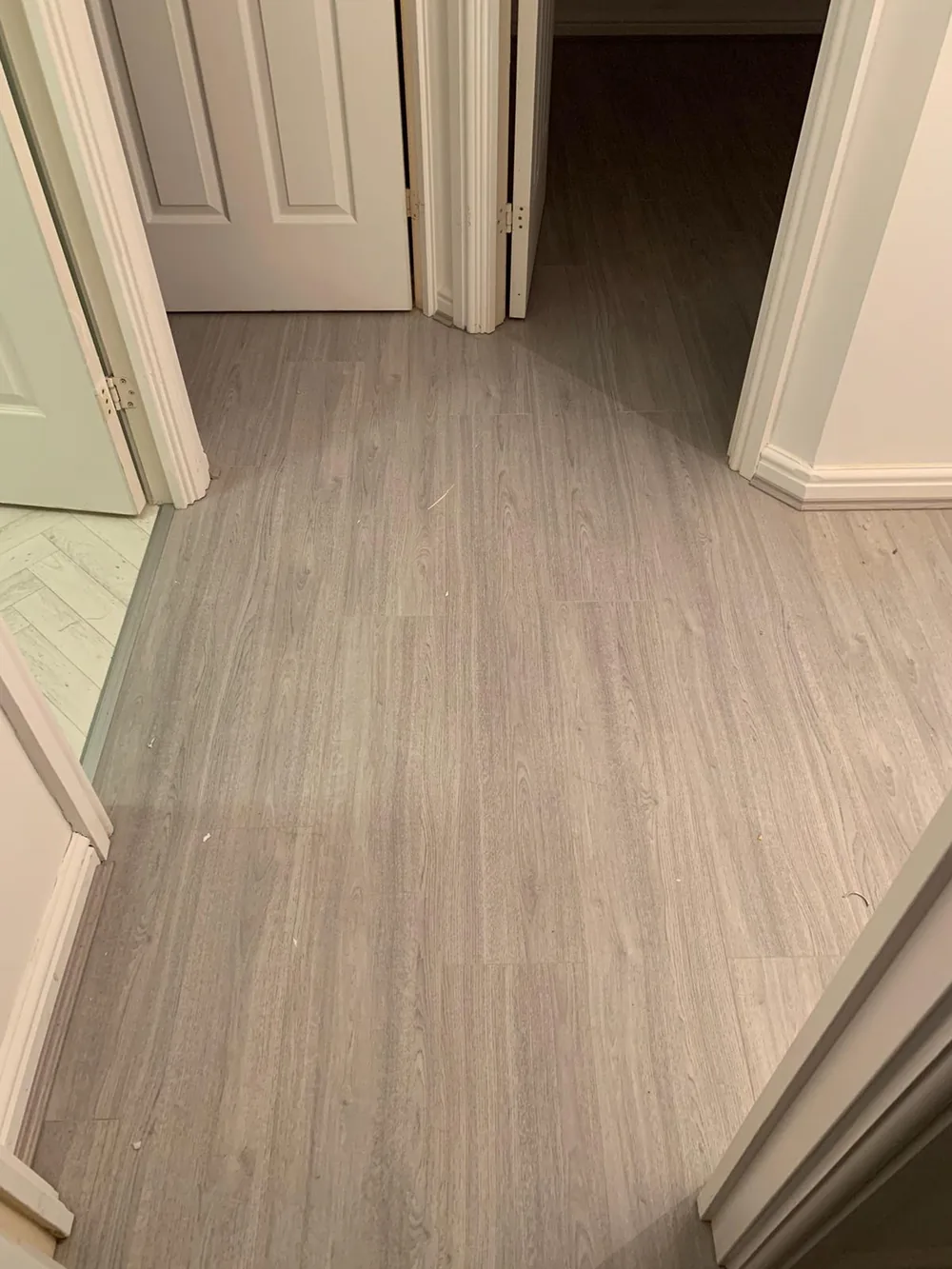 Light grey LVT in a hallway
