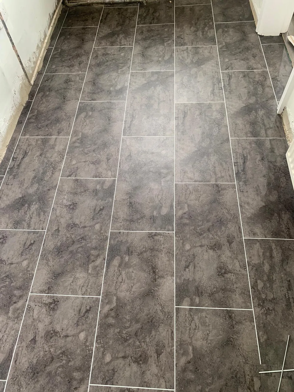 Stone-effect LVT tiles