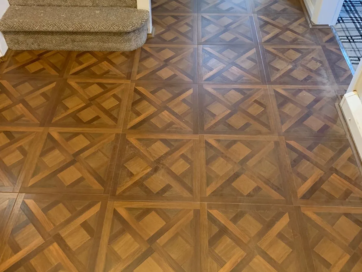 Panelled parquet flooring in a hallway